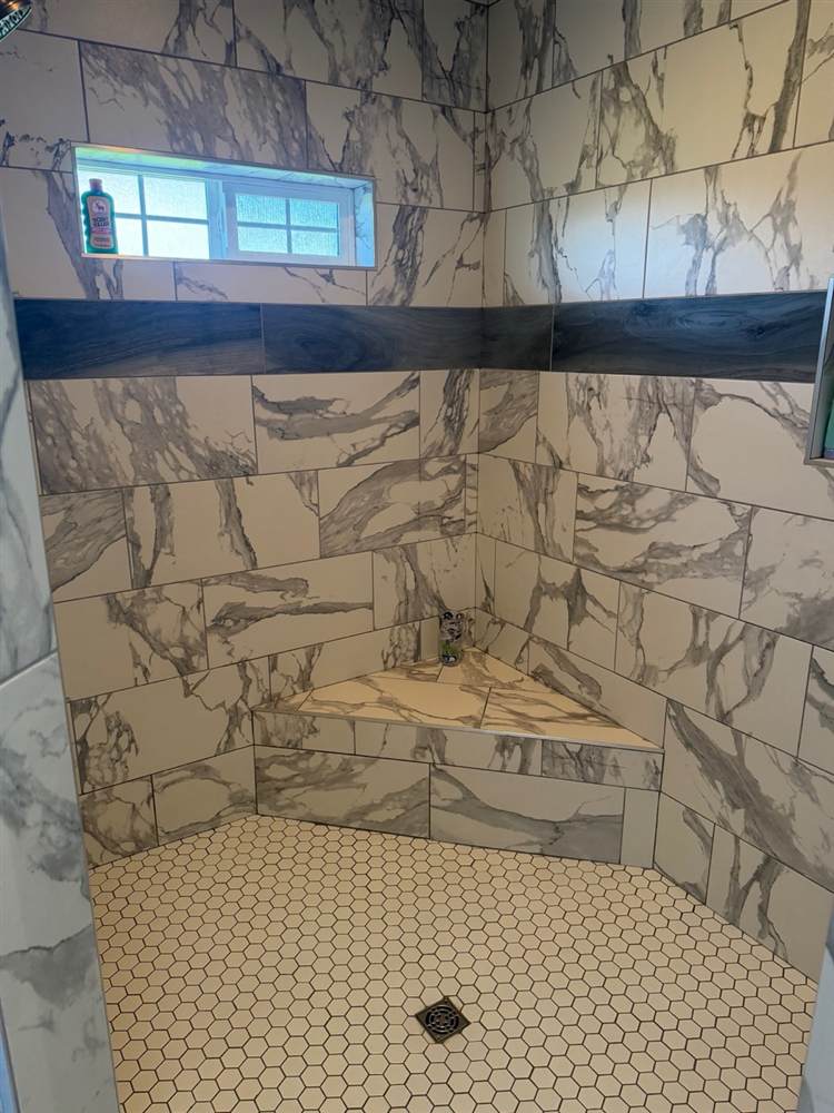 Freshly cleaned bathroom with spotless marble tile